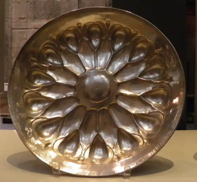Solar disc on a silver bowl